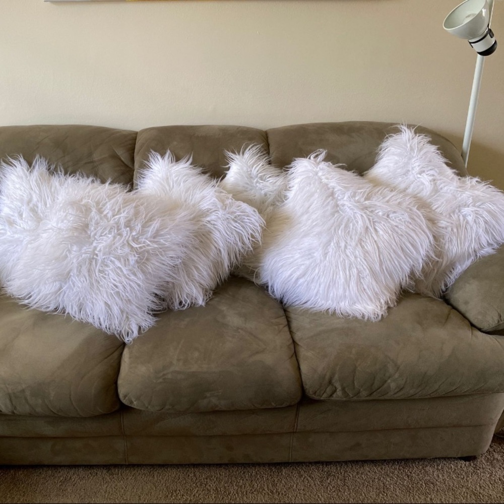 4 fluffy white pillows, very gently used